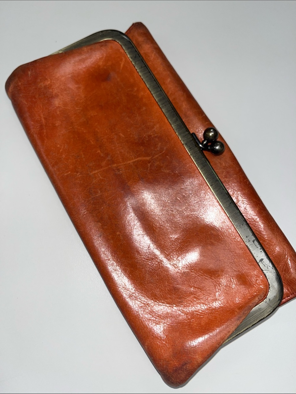 HOBO Rustic Leather Kiss-Lock Wallet - Cognac Orange